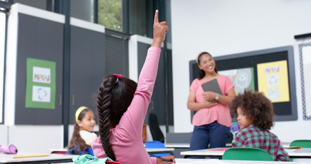 Student Raising Hand in Classroom for Active Learning
