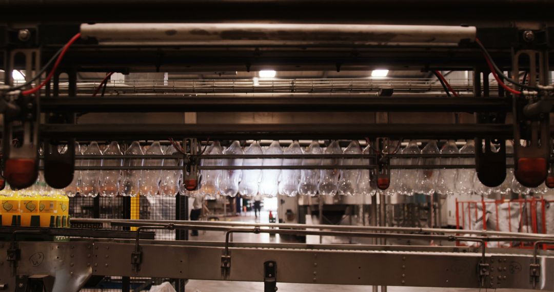 Plastic Bottles on Assembly Line in Modern Beverage Factory - Free Images, Stock Photos and Pictures on Pikwizard.com