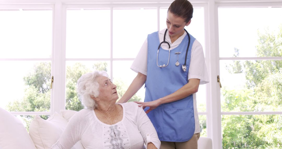 Nurse Assisting Senior Woman at Home - Free Images, Stock Photos and Pictures on Pikwizard.com