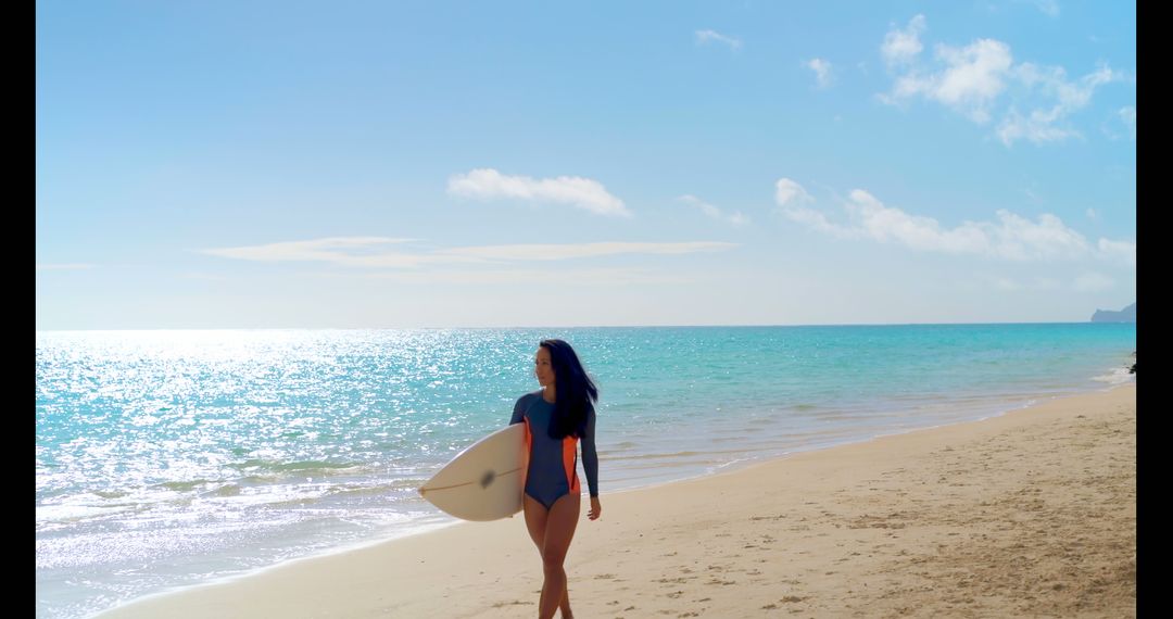 Young Woman Enjoying a Sunny Day at the Beach with Surfboard - Free Images, Stock Photos and Pictures on Pikwizard.com