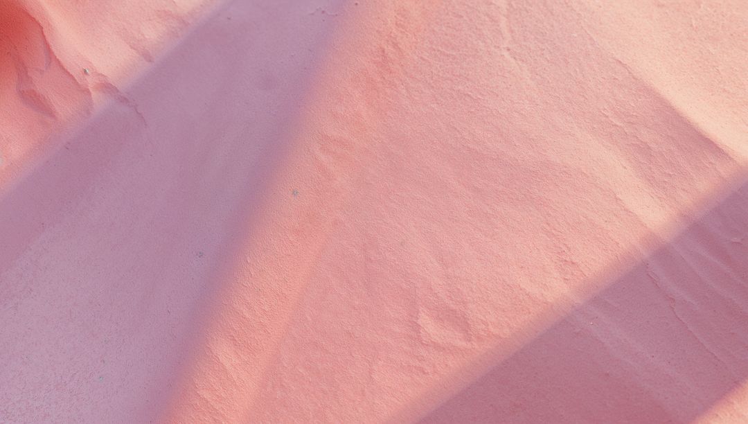Soft Pink Grain Texture Under Gradient Shadow