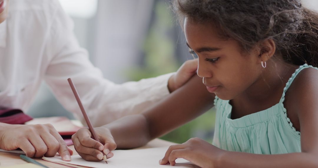 Mother Assists Daughter with Homework and Learning - Free Images, Stock Photos and Pictures on Pikwizard.com