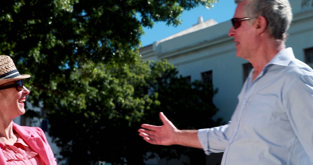 Joyful Couple Enjoying Sunny Day Outdoors