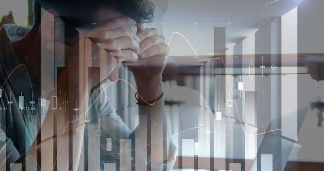 Stressed Businessman Analyzing Financial Chart Data at Work