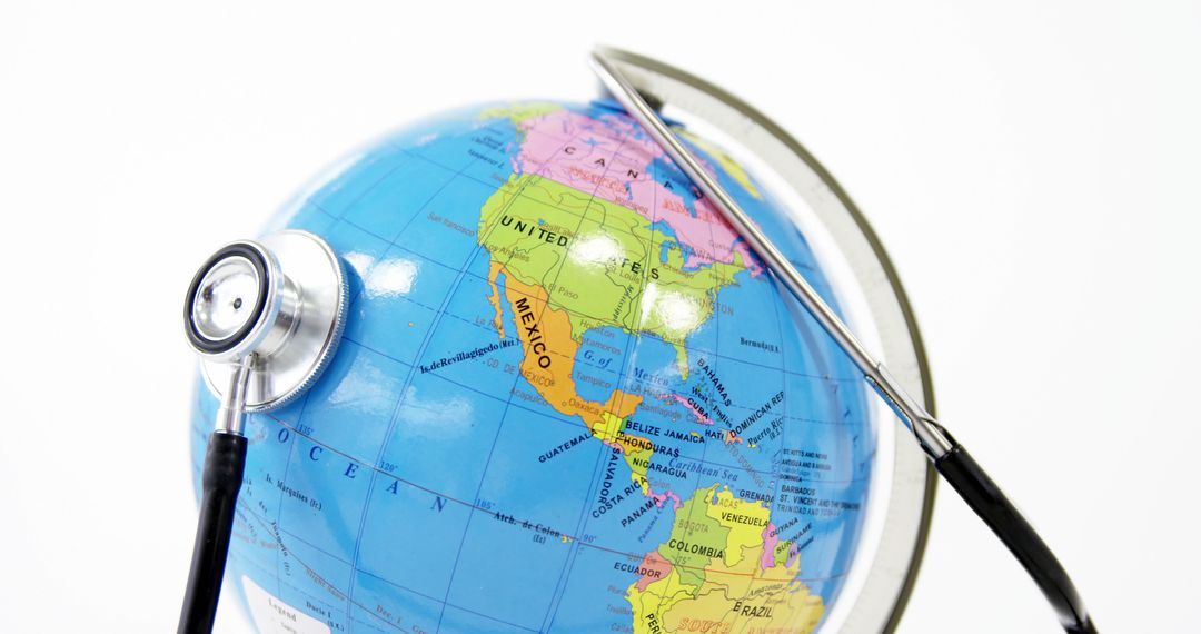 Stethoscope Resting on Globe Representing Worldwide Healthcare - Free Images, Stock Photos and Pictures on Pikwizard.com