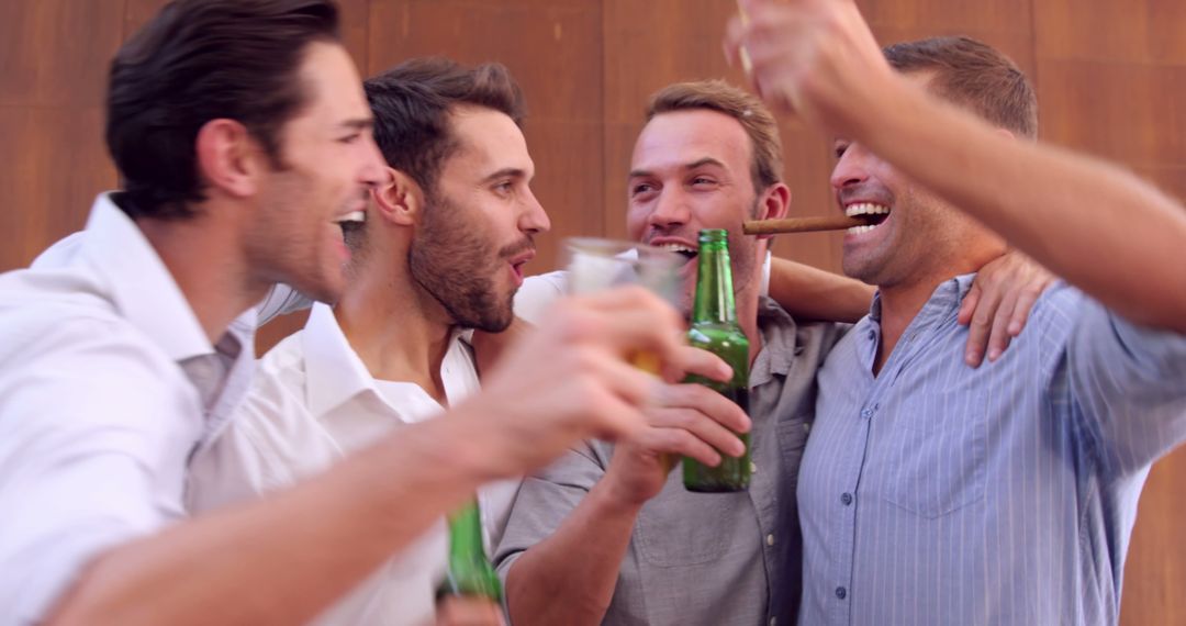 Group of Young Men Celebrating and Toasting with Beer and Cigars - Free Images, Stock Photos and Pictures on Pikwizard.com