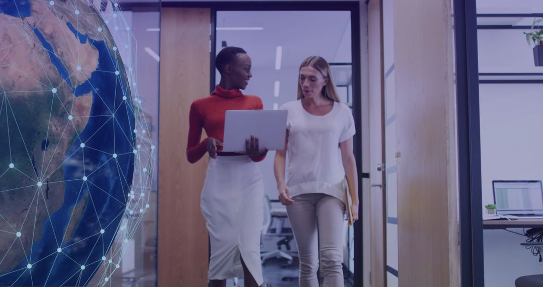 Diverse Professionals Collaborating in Tech-Driven Workspace