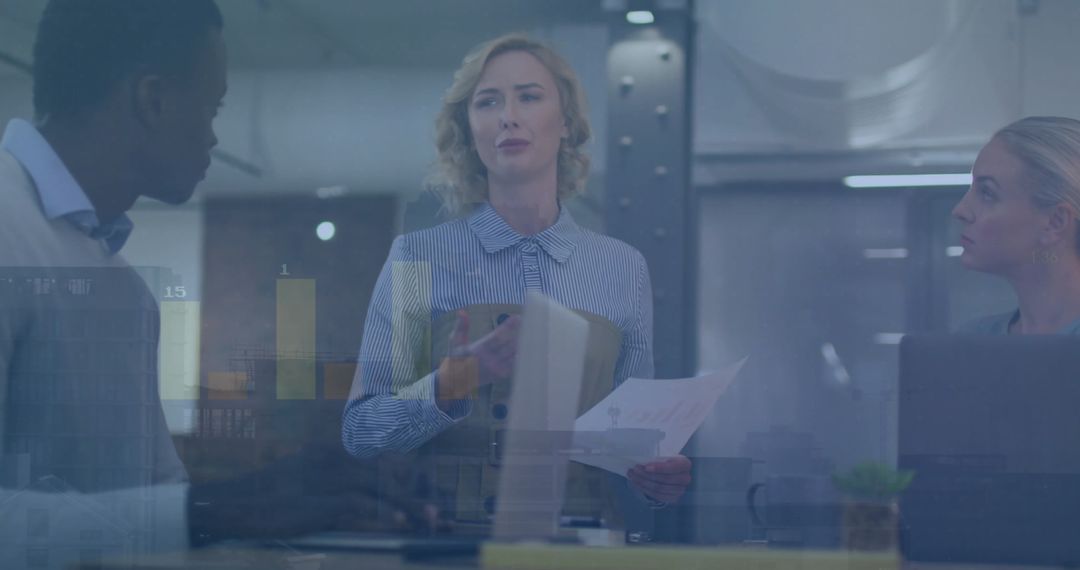 Diverse Professionals Collaborating with Financial Data Visualization