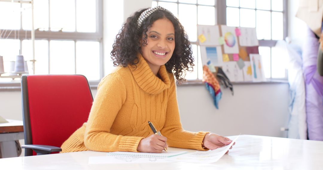 African American Woman Designing at Office Desk - Free Images, Stock Photos and Pictures on Pikwizard.com