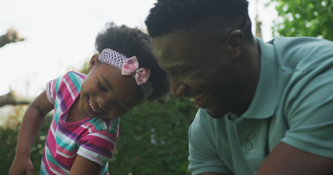 Father and Daughter Enjoying Garden Time