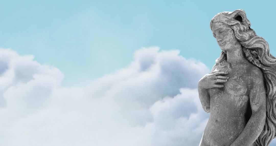 Classical Female Sculpture Against Sky with Clouds