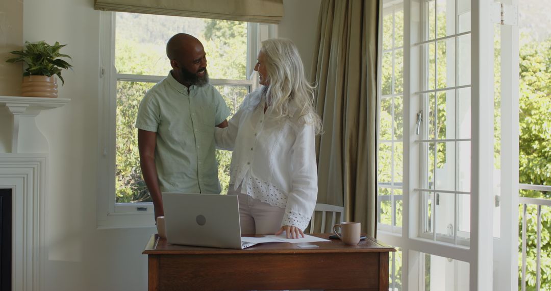 Happy Couple Bonding at Home Office Desk