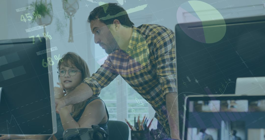 Business Colleagues Analyzing Data in Modern Office Environment