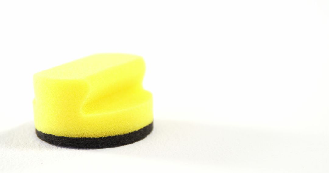 Closeup Yellow Cleaning Sponge White Background - Free Images, Stock Photos and Pictures on Pikwizard.com