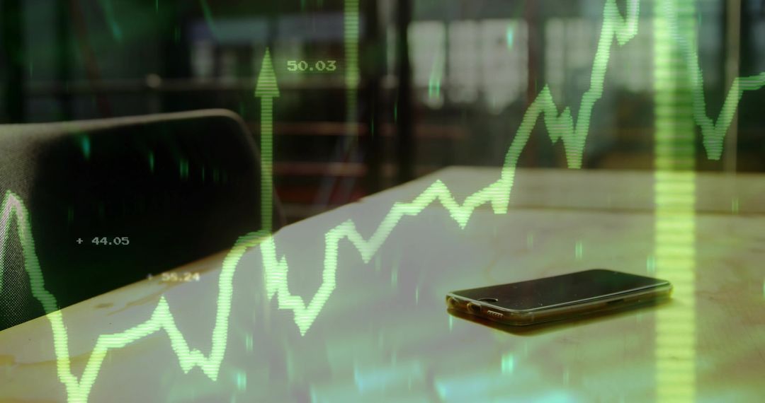 Smartphone on Table with Overlay of Digital Financial Charts
