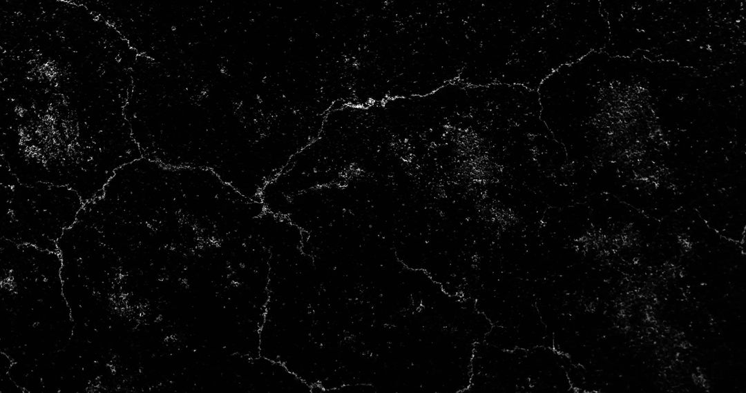 Crackled White Patterns on Black Texture Background
