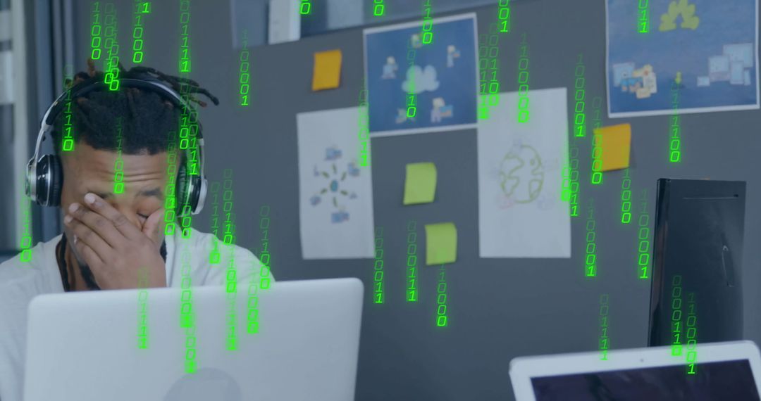 Stressed African American Businessman with Digital Data Overload