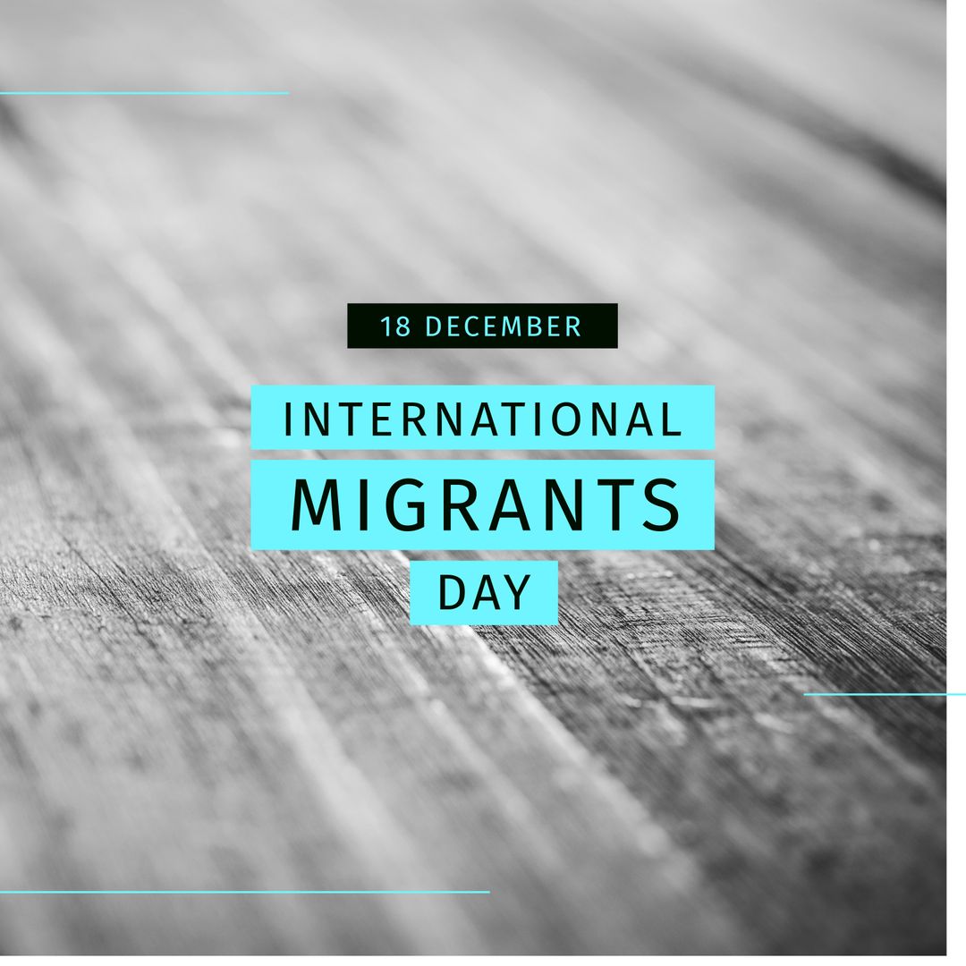 International Migrants Day Text on Wooden Background