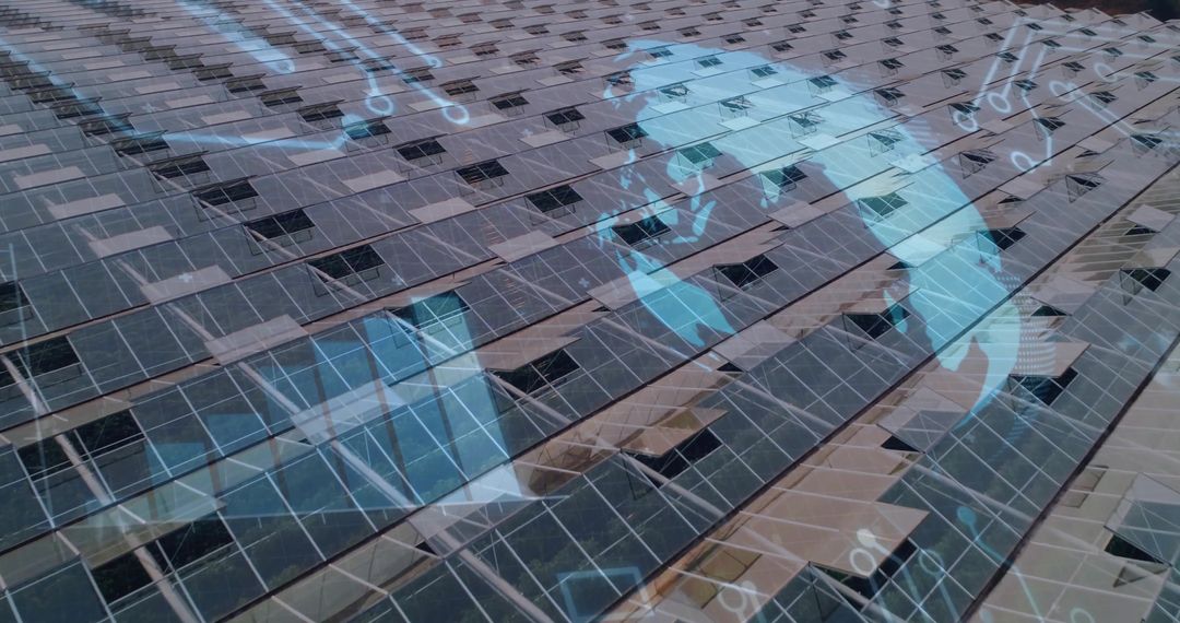 Aerial View of Solar Panels with Globe and Circuit Overlay