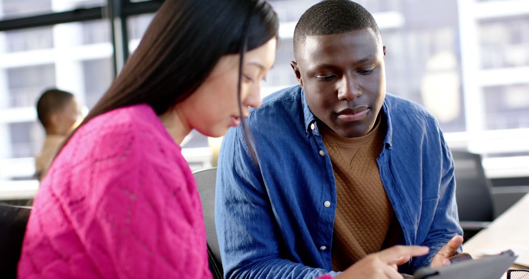 Collaborative Team Working in a Modern Office Environment