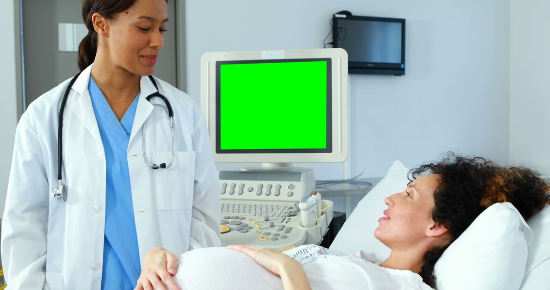 Doctor with Pregnant Woman during Ultrasound Examination in Hospital - Free Images, Stock Photos and Pictures on Pikwizard.com