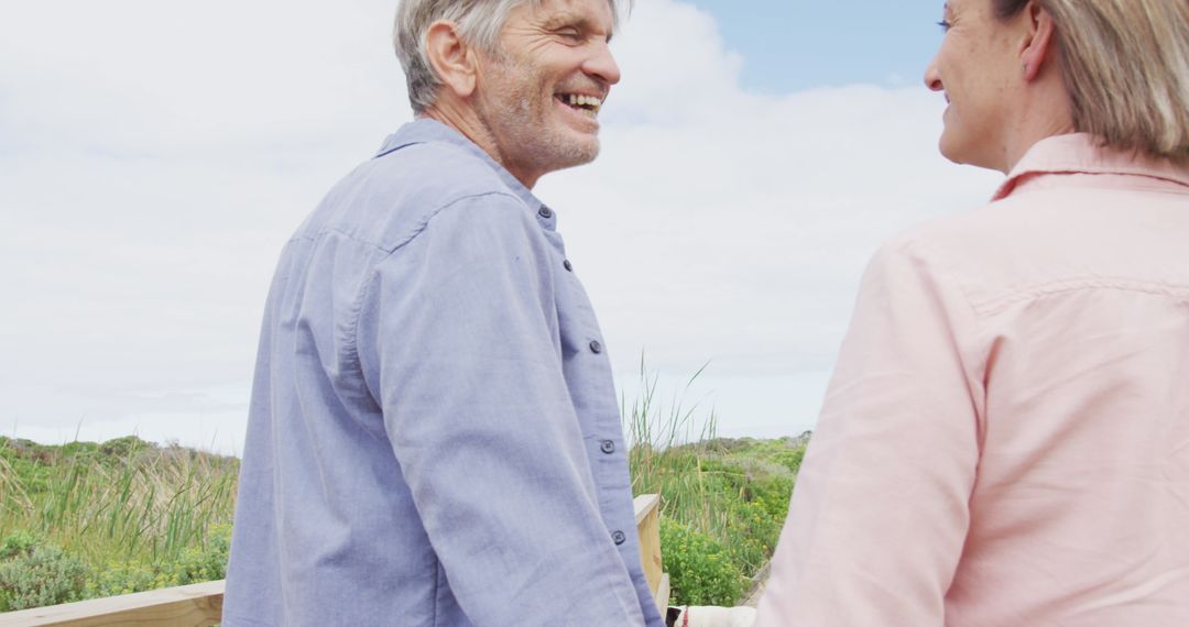 Elderly Couple Enjoying a Relaxed Walk in Nature