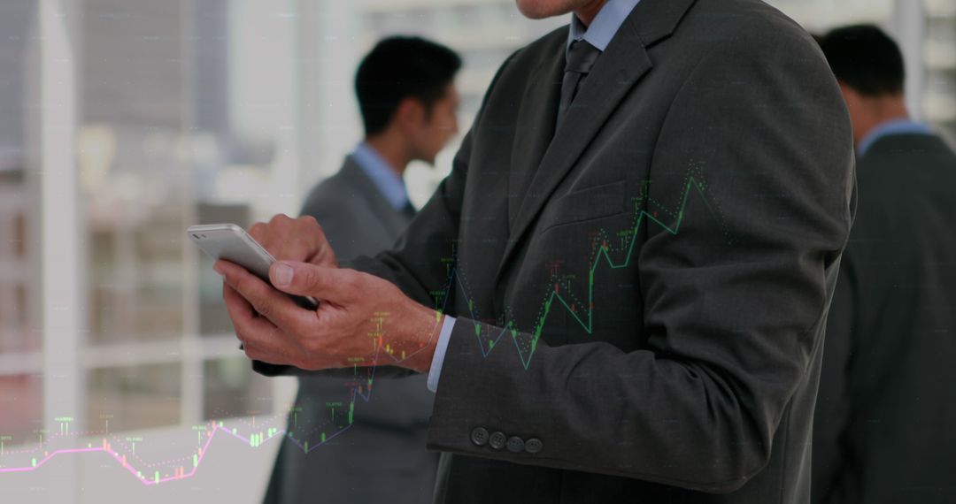 Businessman Analyzing Financial Data on Smartphone with Rising Charts