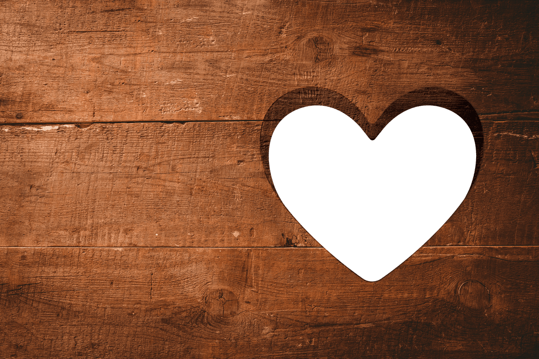 Heart Shaped Hole in Wood Textured Transparent Background