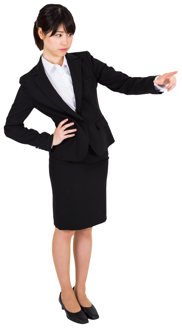 Focused Asian Businesswoman in Formal Suit Pointing - Download Free Stock Images Pikwizard.com