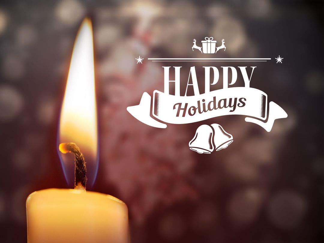 Glowing Candle with Happy Holidays Text Creates Festive Atmosphere