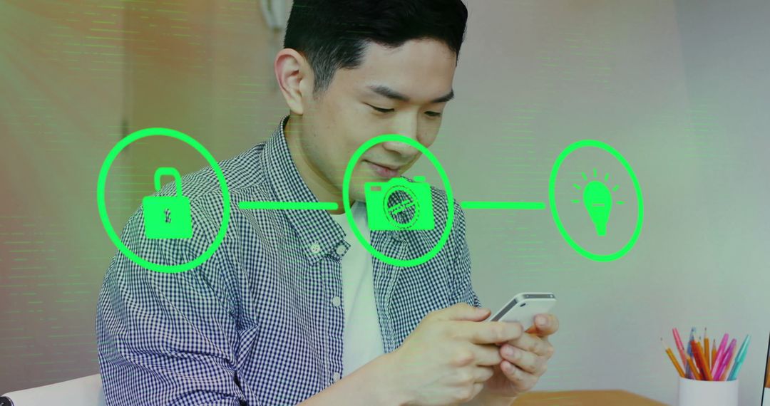 Asian Businessman Utilizing Smartphone with Digital Icons