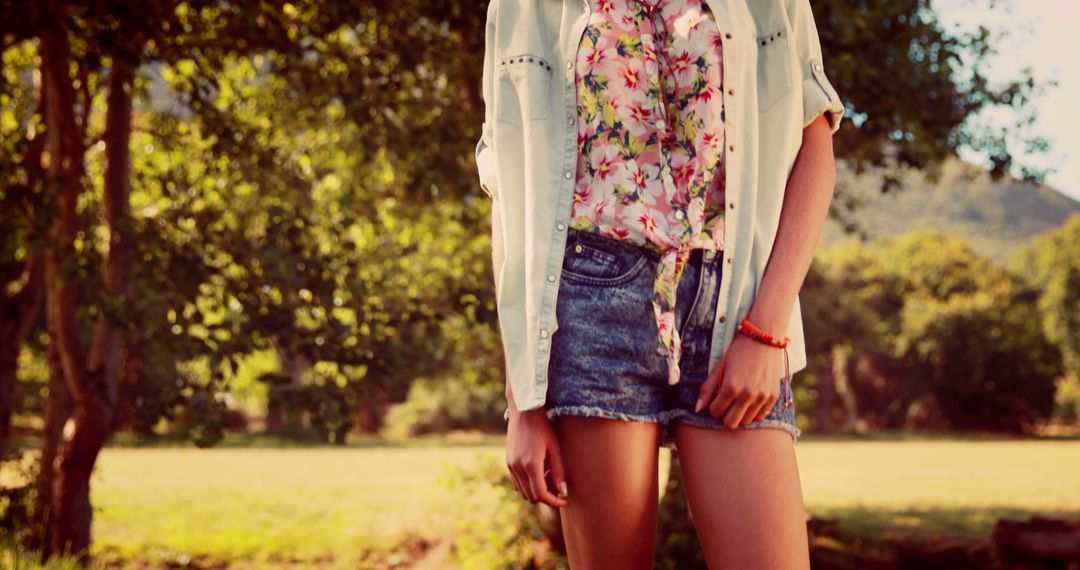 Trendy Woman in Summer Outfit Standing Outdoors - Free Images, Stock Photos and Pictures on Pikwizard.com