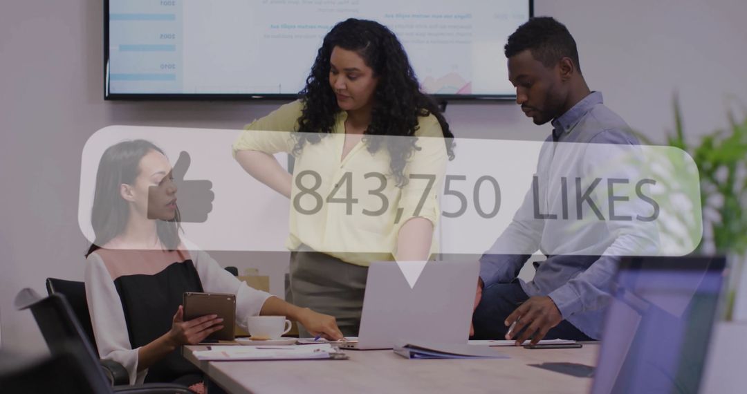 Diverse Team Discussing Online Engagement in Modern Office