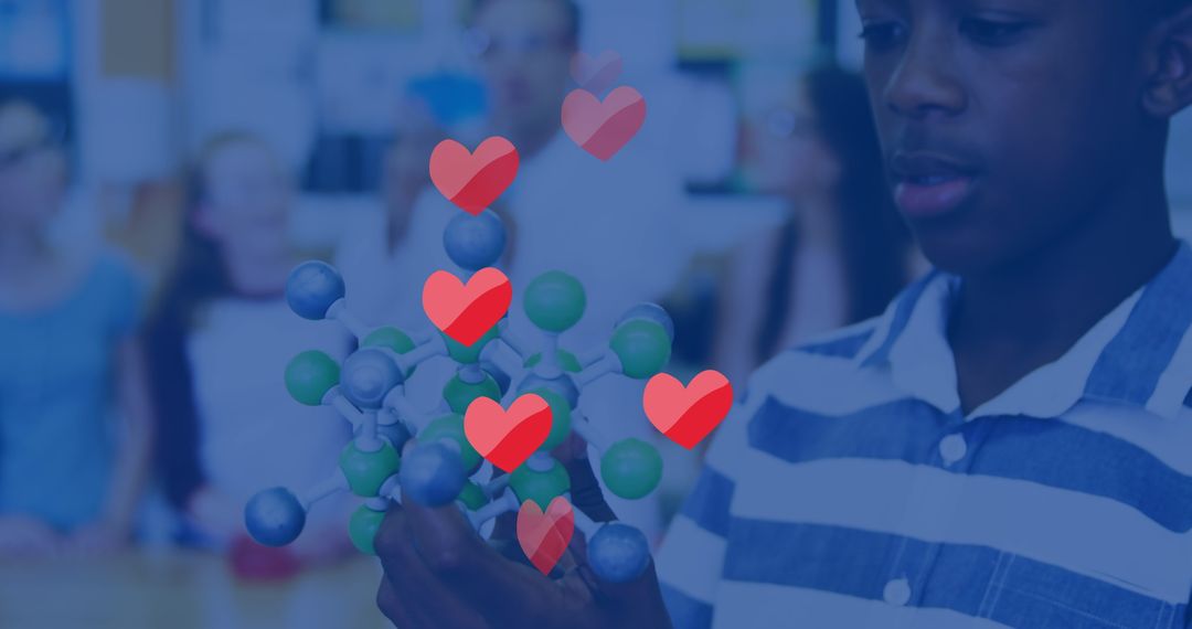 Teen in Classroom Exploring Chemistry Model with Interactive Heart Graphics