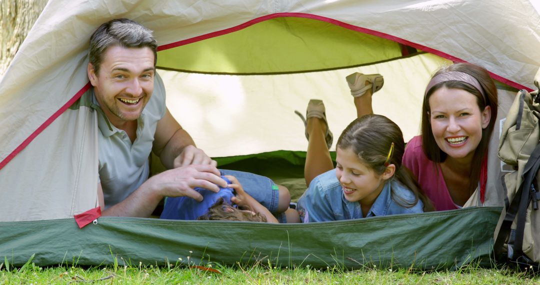 Happy Family Enjoying Camping Inside Tent - Free Images, Stock Photos and Pictures on Pikwizard.com