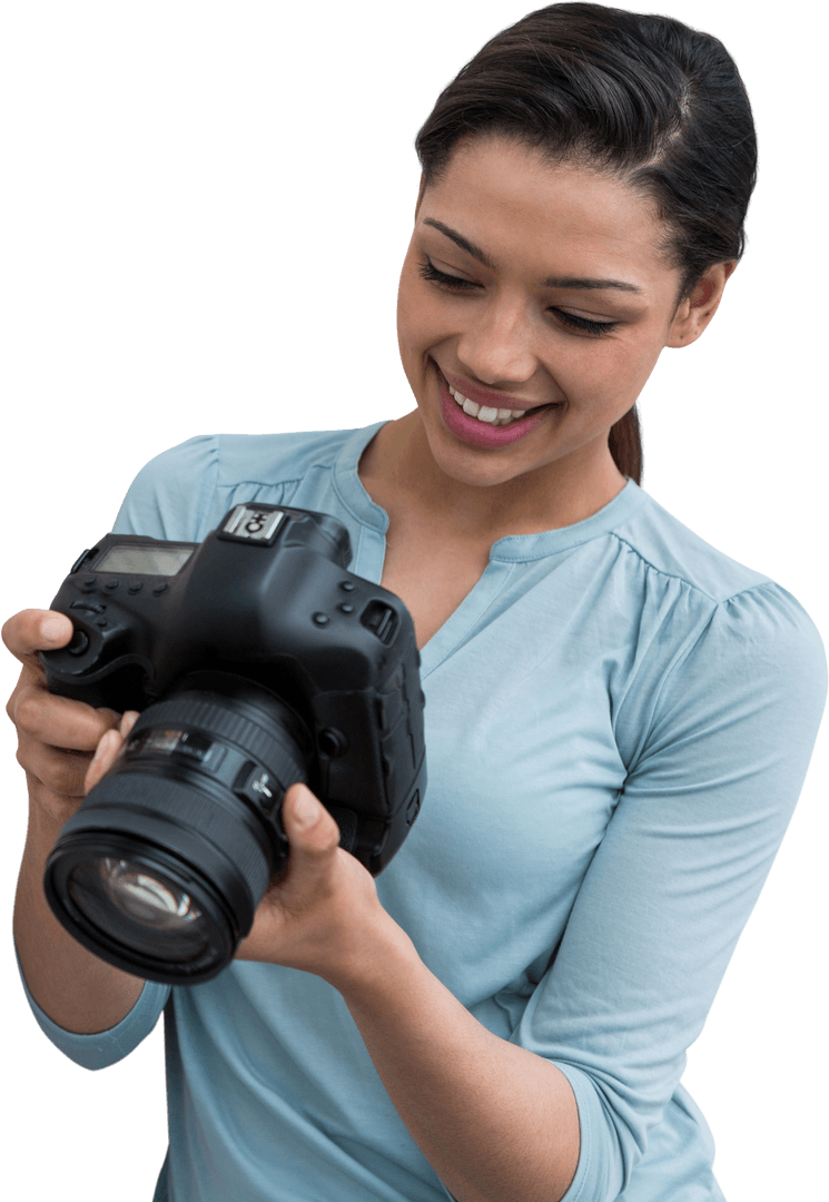 Smiling Female Photographer Inspecting Transparent Digital Camera
