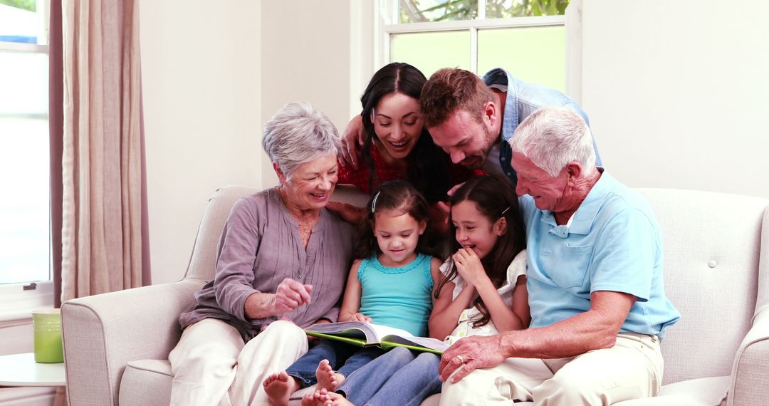 Happy Multigenerational Family Reading Book Together at Home - Free Images, Stock Photos and Pictures on Pikwizard.com