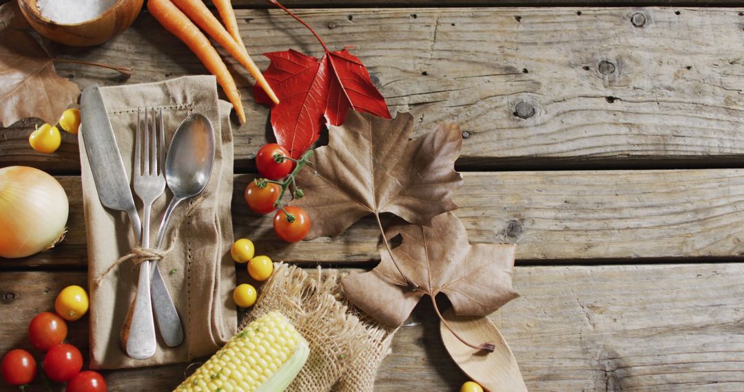 Autumn Harvest Table Setting with Rustic Utensils and Vegetables - Free Images, Stock Photos and Pictures on Pikwizard.com