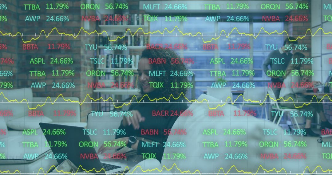 Image of stock market data processing over biracial woman using laptop at office - Free Images, Stock Photos and Pictures on Pikwizard.com
