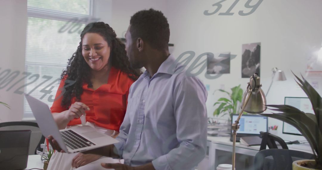 Team Collaborates on Data Analysis in Modern Office