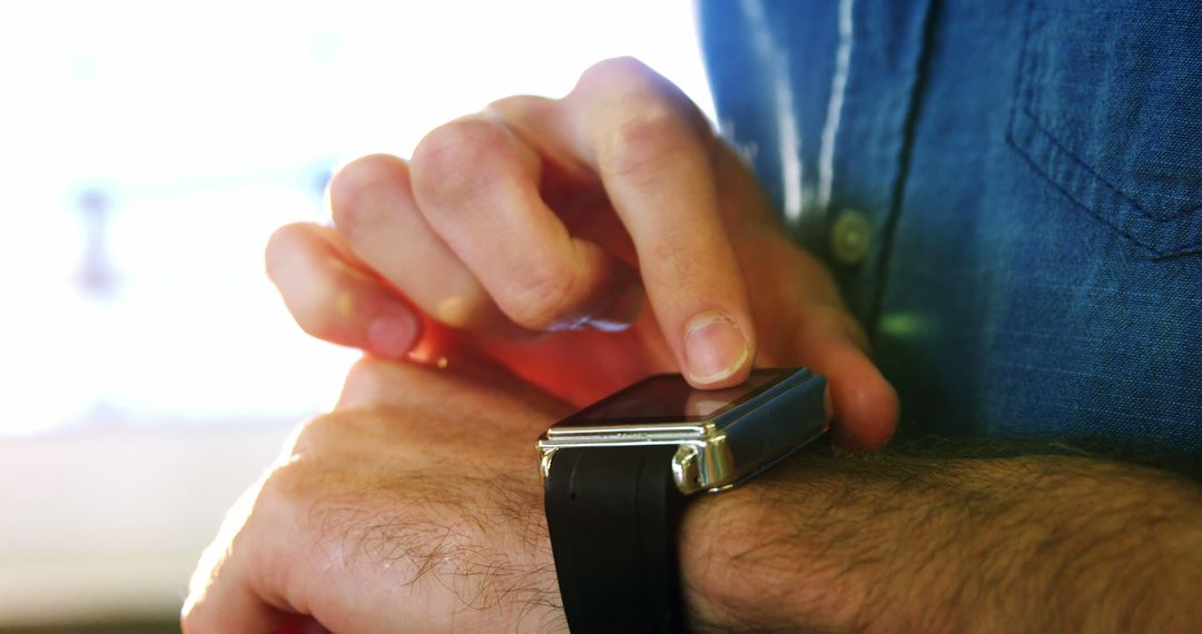 Person Using Smartwatch with Touchscreen - Free Images, Stock Photos and Pictures on Pikwizard.com