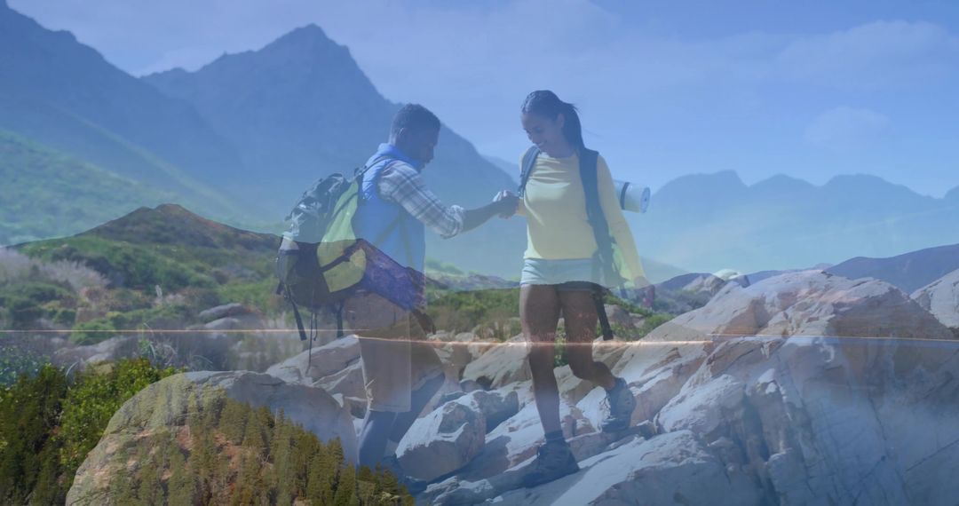 Adventurous Couple Hiking Together in Mountain Scenery