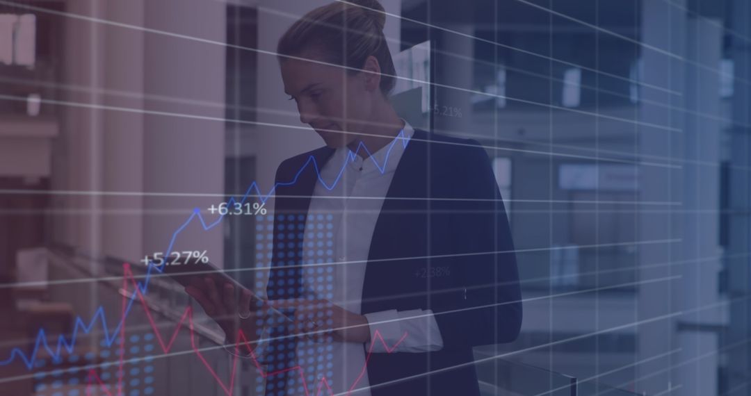 Businesswoman Analyzing Financial Data on Tablet with Graph Overlay