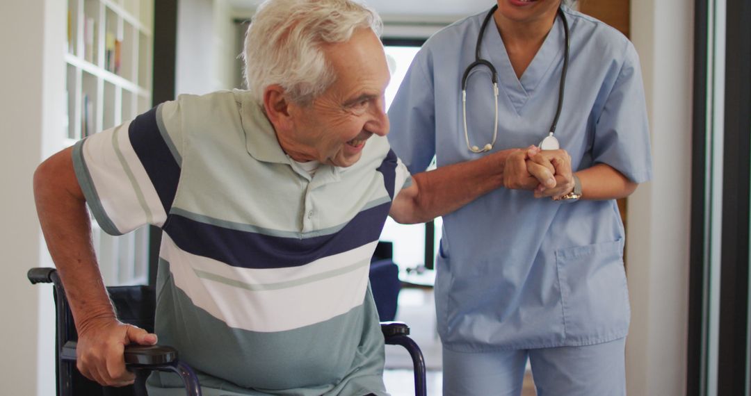 Image of happy biracial female doctor taking care of caucasian senior man - Free Images, Stock Photos and Pictures on Pikwizard.com