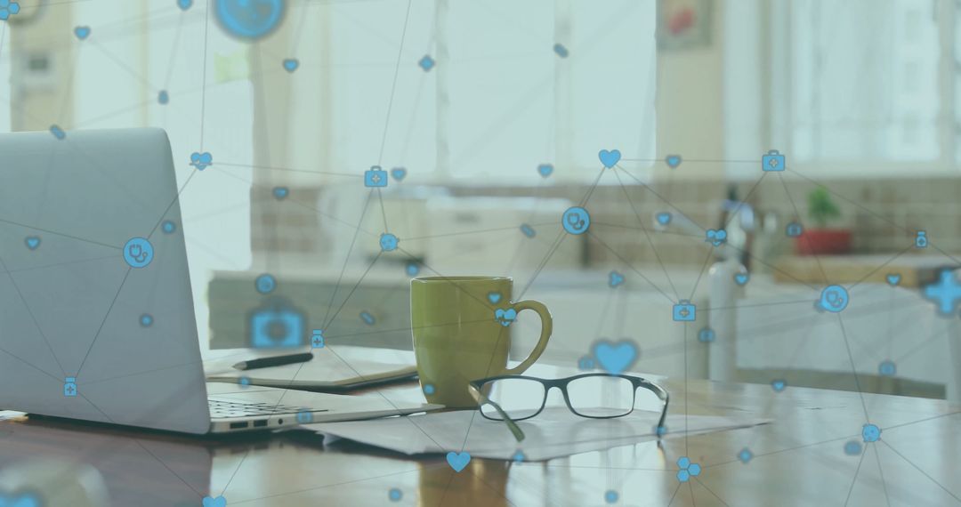 Interconnected Digital Workspace with Laptop and Coffee Mug