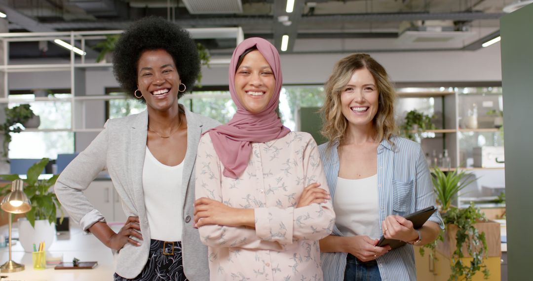 Diverse Group of Businesswomen Smiling in Modern Office - Free Images, Stock Photos and Pictures on Pikwizard.com