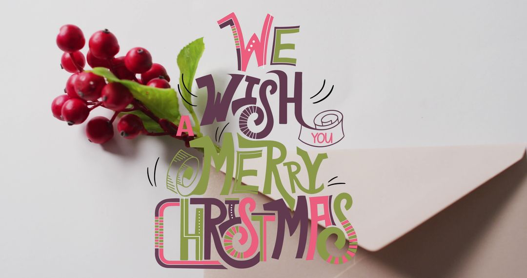 Christmas Card with Festive Text and Red Berries on Grey Surface