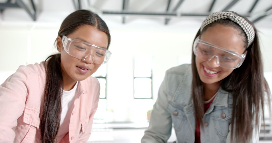 Teenage Students Conducting Science Experiment in School Laboratory