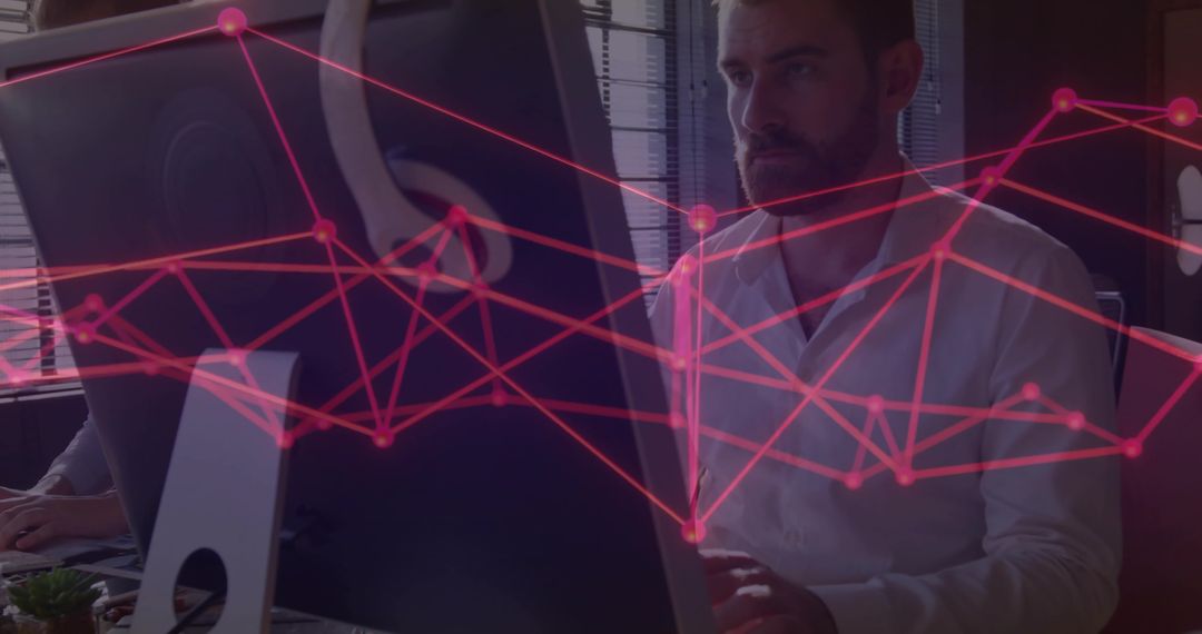 IT Professional Analyzing Digital Data Network at Office Desk