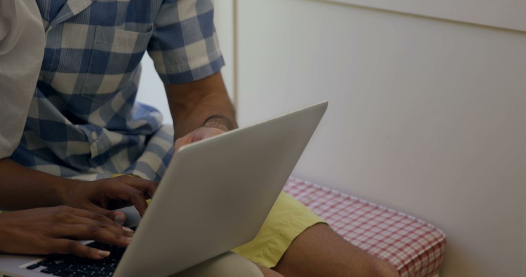 Team Collaboration on Laptop for Projects and Meetings
